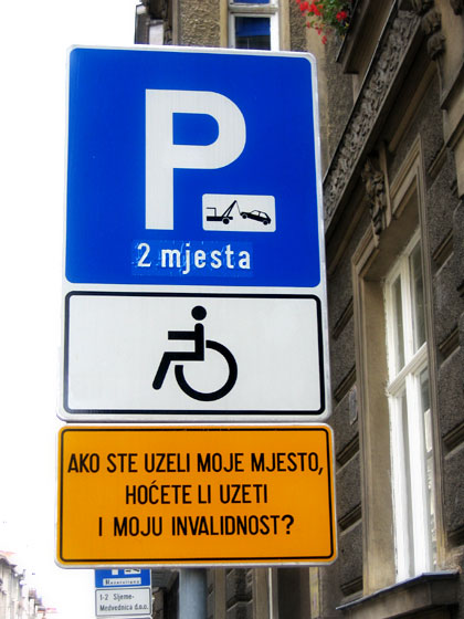 traffic sign for reserved parking spot